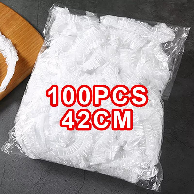 100 szt. Jednorazowe czapeczki pod prysznic Wodoodporne Plastikowe nakrycia głowy Kobiety Przezroczyste do farbowania włosów Salon Elastyczna czapeczka do kąpieli dla Hotelu Uroda