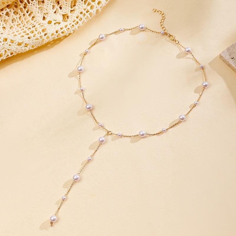 

Pearl necklace jewelry women s autumn and winter fashion versatile niche light luxury fringed sweater chain long