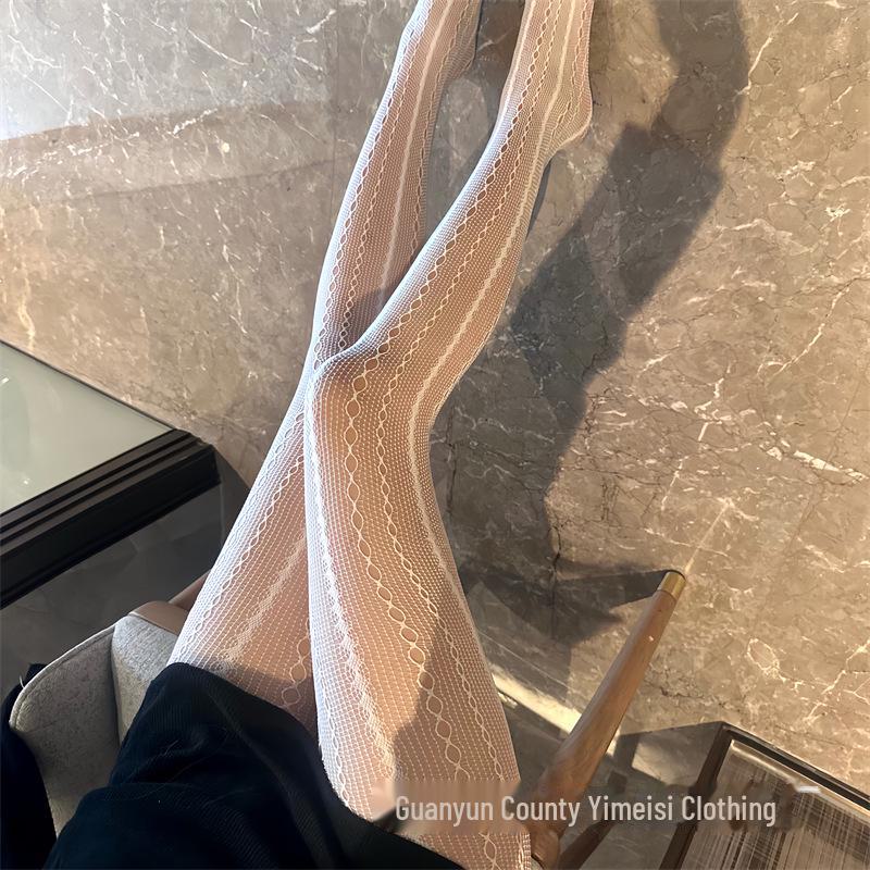 

Сексуальные чулки в сеточку с вертикальными полосками: Вдохновлено блогерами, идеально подходит для демонстрации красивых ног весной и летом. One size (80-140 jin) белый