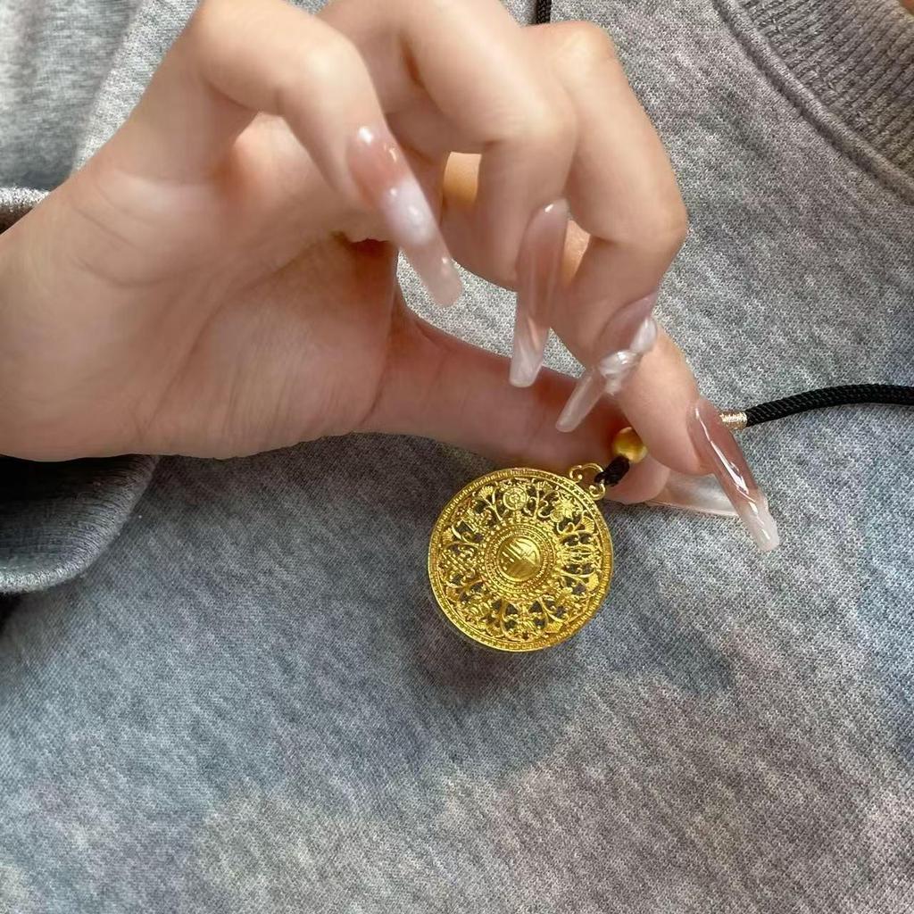 Golden Fu Compass Pendant: Chinese Auspicious Hollow Round Necklace with Black Rope.