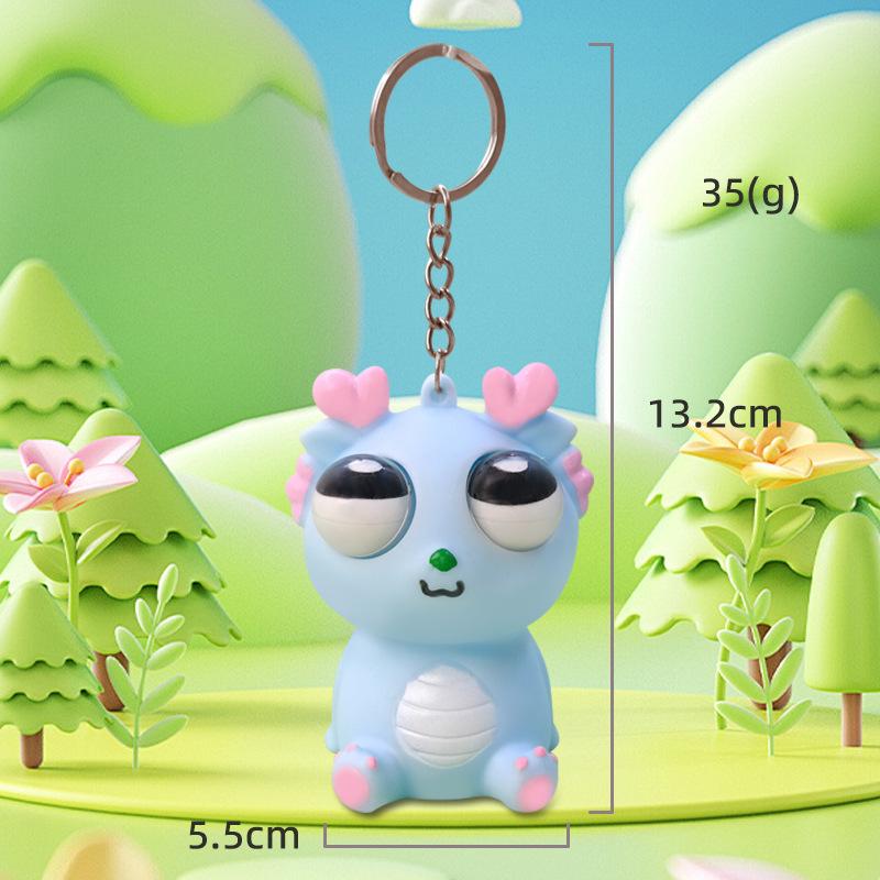 Exploding Eye Dragon Keychain: Squishy Stress Relief Toy and Pendant