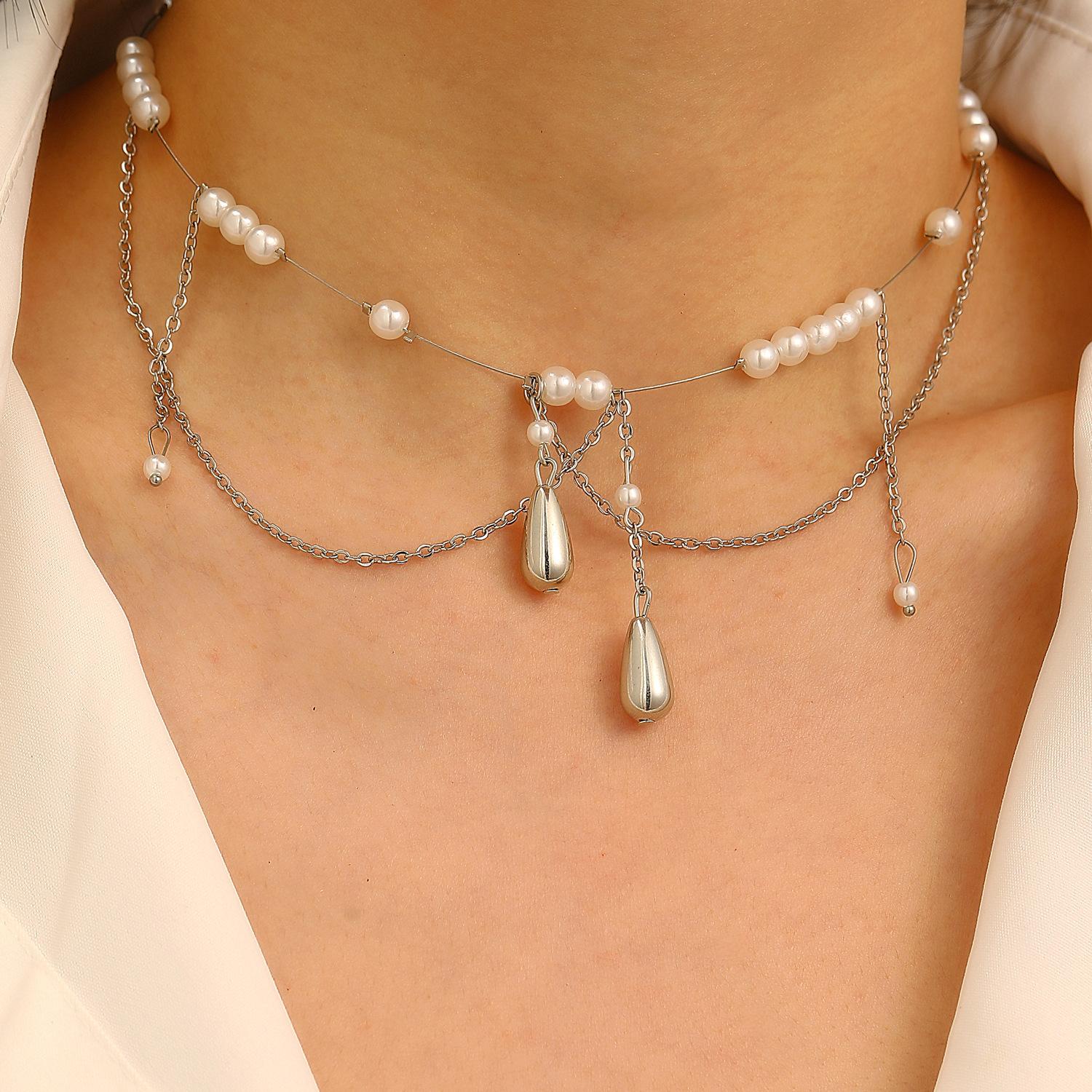 

Легкое роскошное изысканное современное ощущение имитация жемчуга кисточка имитация бриллиантов крест чокер ожерелье кулон 1 pcs