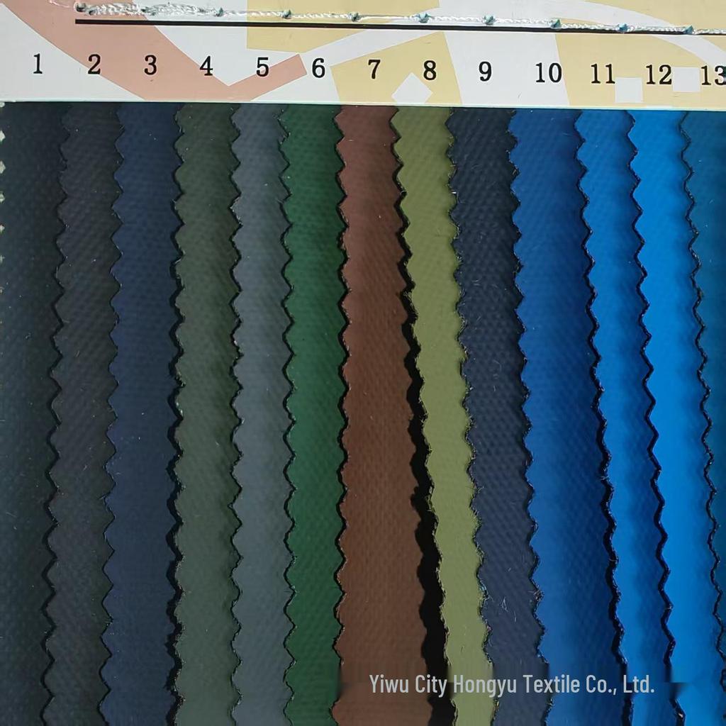 In-Stock Eco-Friendly Outdoor Bag Fabric: 600D Oxford Cloth with Release Paper Film Glue for Luggage and Handbags.