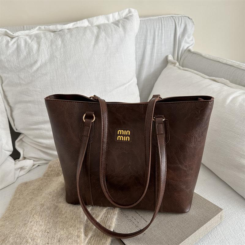 Simple casual tote bag, new fashion commuter shoulder bag, niche design handbag