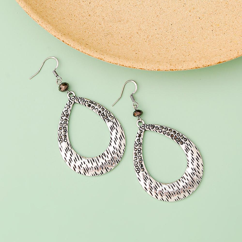 

Винтажные серьги-капли из цинкового сплава с нерегулярным ребристым дизайном и инкрустированными бриллиантами античный серебряного