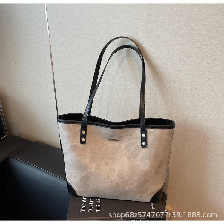 Large-capacity hand-held tote bag women's 2025 new trendy fashion leisure college student commuting shoulder bag for class