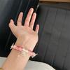 Chinesischer Stil Mondperlen-Handkette mit Schmetterlingsdesign Handgefertigtes Geschenk für Frauen