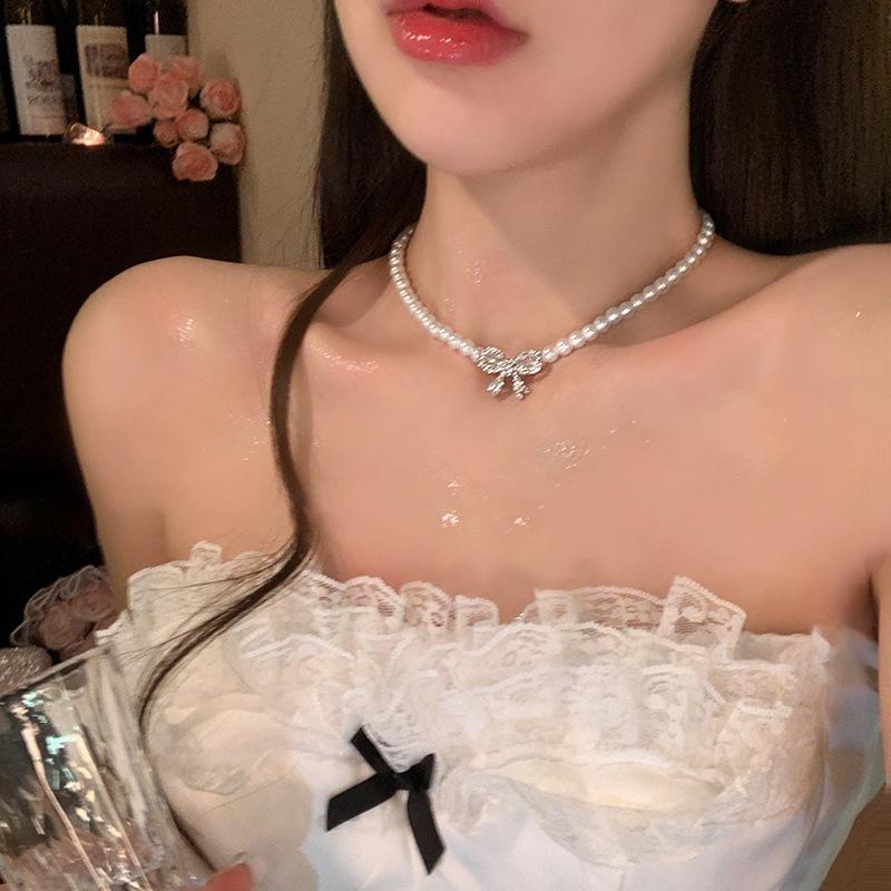 French temperament pearl necklace women's 2025 new diamond-encrusted bow collarbone chain light luxury high-end dress accessories