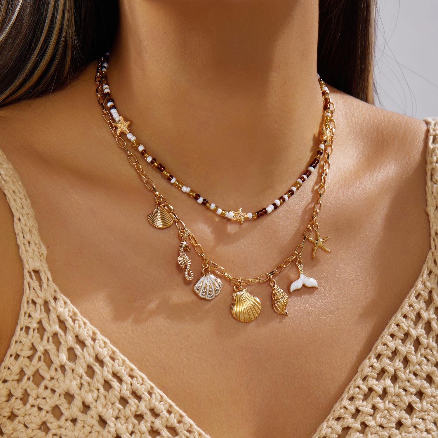 

2pcs Bohemian Rice Beads Starfish Pendant Necklace Set for Women Seahorse Conch Fish Tail Clavicle Chain Summer Beach Jewelry