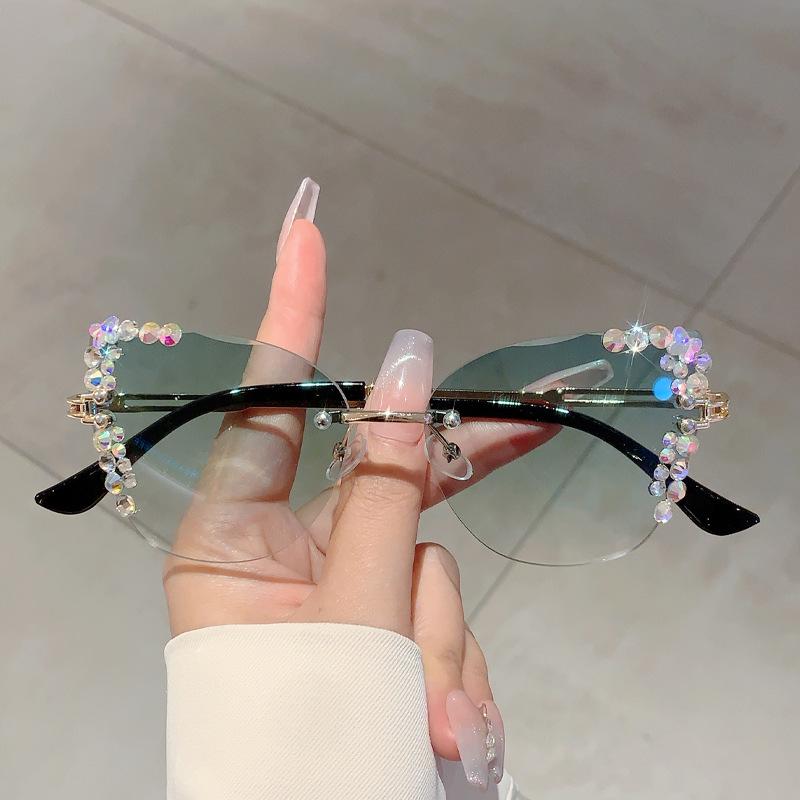 Frameless trimmed fashion diamond-encrusted sunglasses, the same plain and thin light luxury sunglasses
