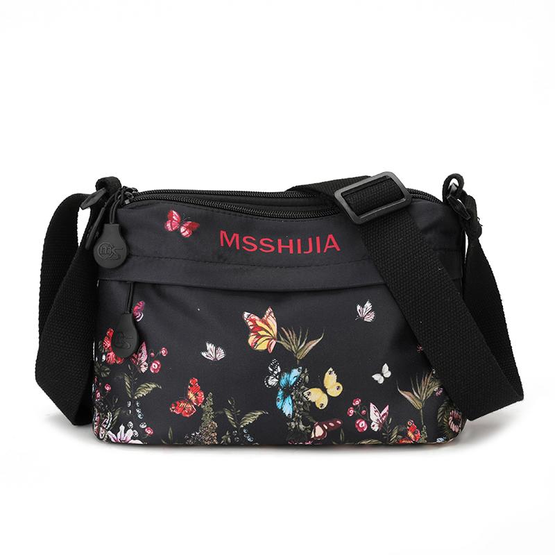 

Женская сумка-мессенджер для поездок на работу, нейлоновая женская многослойная сумка через плечо большой вместимости с украшением в виде бабочки чёрный