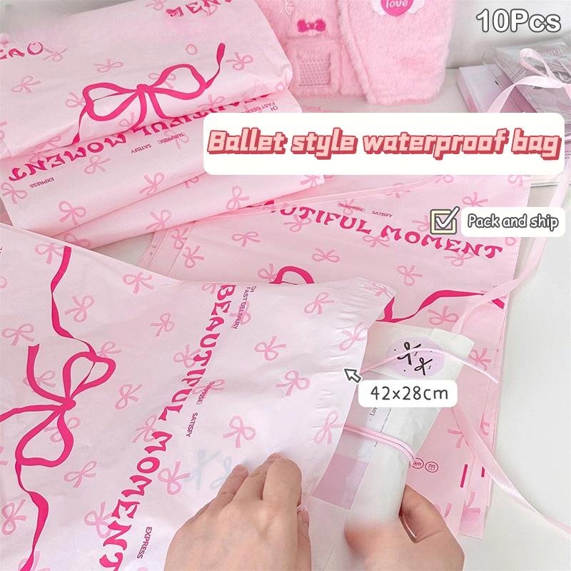 10 Stück rosa Kunststoff-Kuriertaschen mit Schleife und Knoten, bedruckt, Express-Umschlag, Kleidungsverpackung, Versandumschläge, selbstklebende Versandtasche