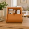 Small orange box organizer with a sliding lid