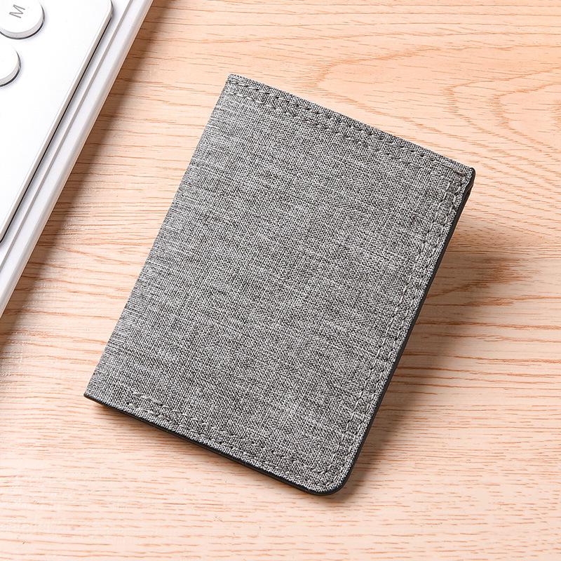 Men's Ultra-Thin Canvas & Leather Wallet: Multi-Card, Slim, Folding Design for Students & Youth.