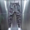 Jarní podzimní pánské kalhoty Janpan móda streetwear tepláky pánské ležérní pánské oblečení elastický pas pánské tepláky