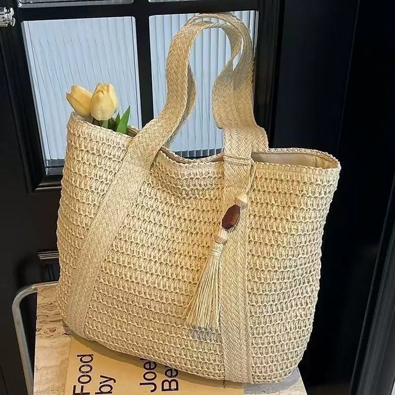 Straw Woven Tote Shoulder Bag with Tassel Detail and Spacious Interior