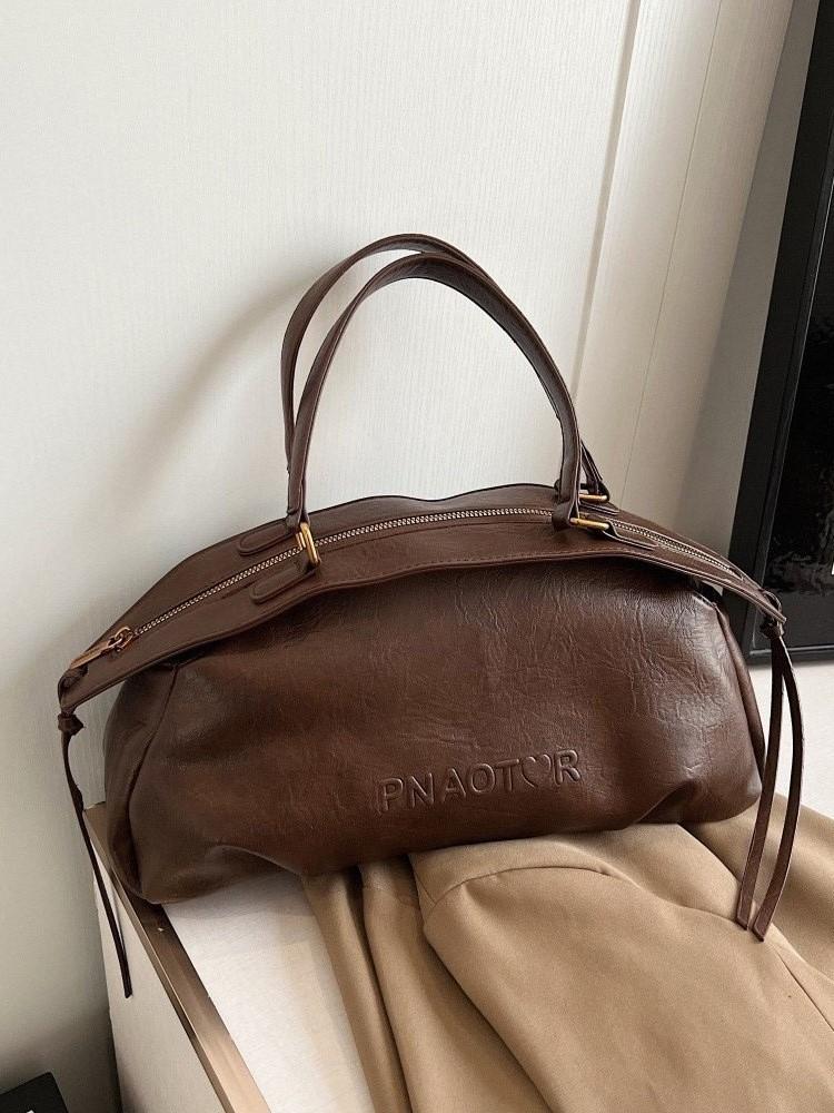 

High-end underarm bowling bag women s 2025 winter fashion trendy shoulder bag simple casual niche handbag