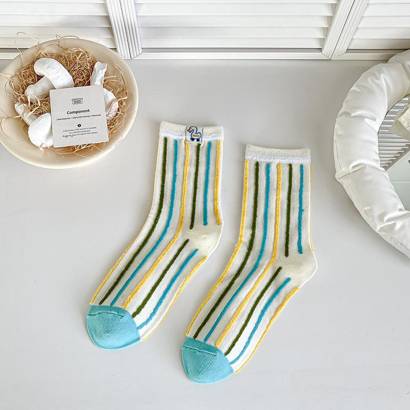 Cartoon Fabric Label Socks for Women's Summer Trend Design. Colorful Polka Dot Stripes Are Cute and Funny. Wear Mid-calf Socks Inside Out
