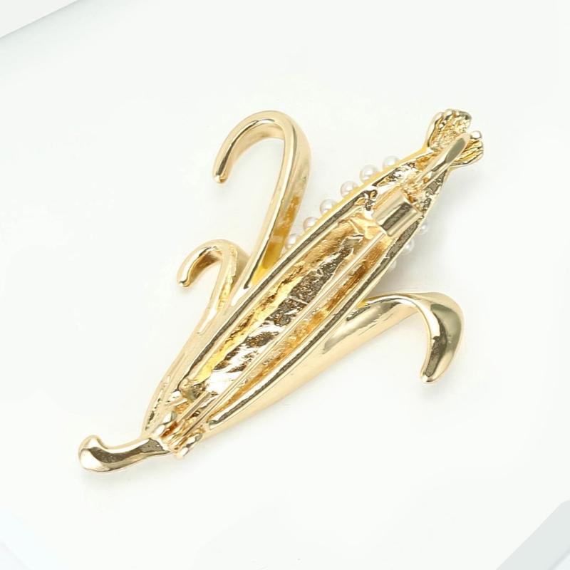 Vintage špendlík inspirovaný kukuřicí zdobený třpytivými imitacemi diamantů a perlami, dodávající eleganci jakémukoli oblečení. Dárek.
