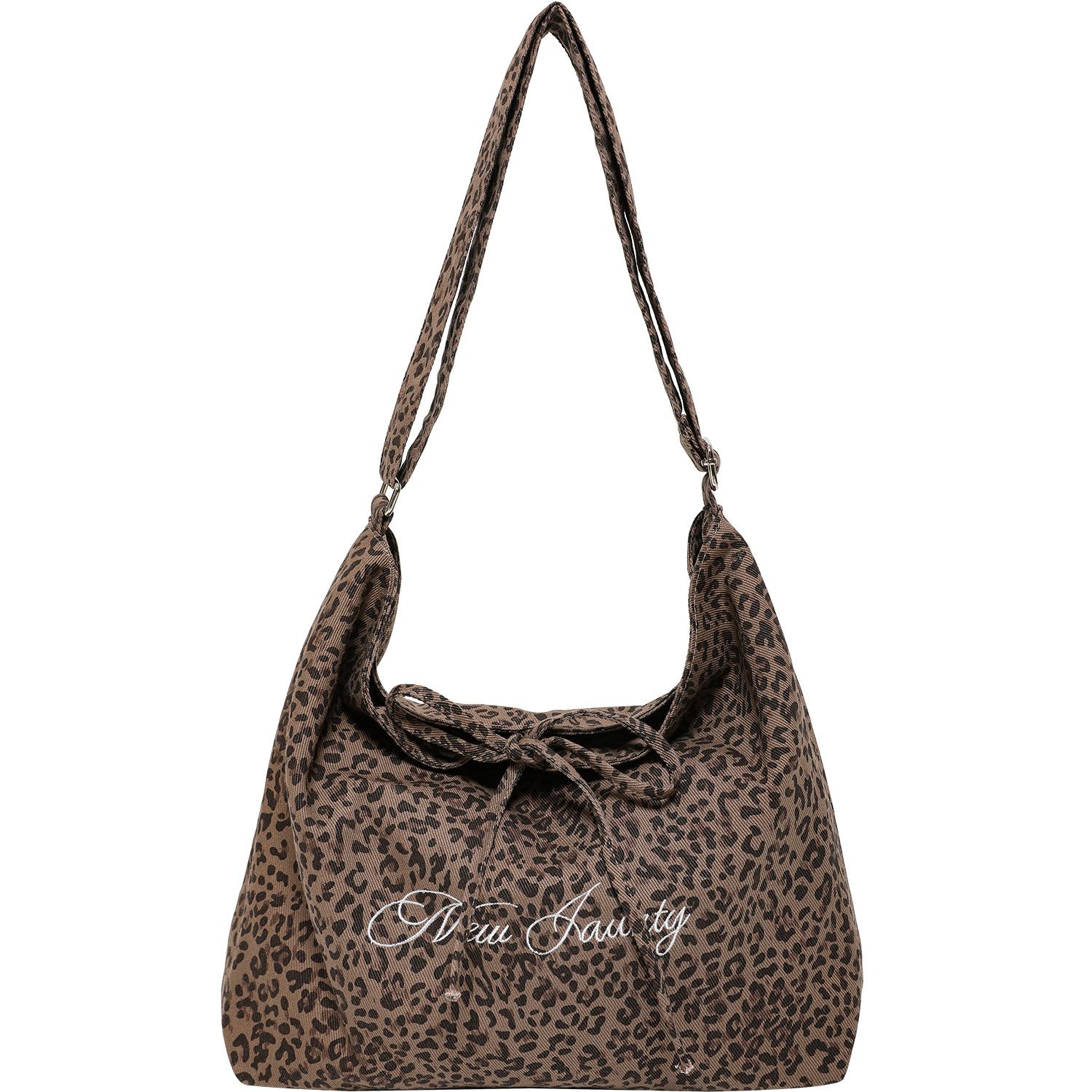 

Это нишевый дизайн с непринужденным и расслабленным ощущением.. Это сумка для пельменей большой вместимости для студентов коричневый/цветной печати леопарда