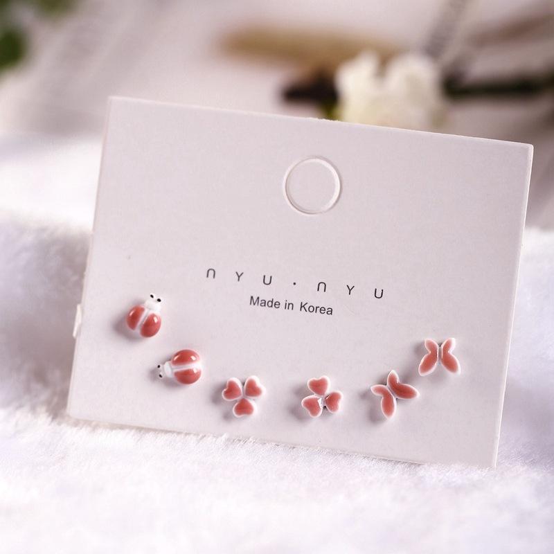 

New ceramic jewelry, cute and fresh earrings, ear piercing care, no need to remove earrings when sleeping, gift for female students, steel pins Pink Butterfly Clover
