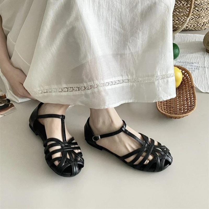Soft-soled retro woven baotou sandals women's fashion flat-soled student pig cage shoes tide