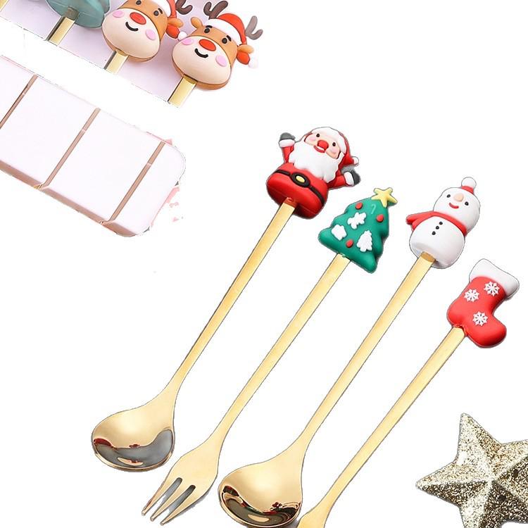 Christmas Cartoon Cutlery Set: Forks, Spoons, and Gift Box Featuring Cute Reindeer and Tree Designs.