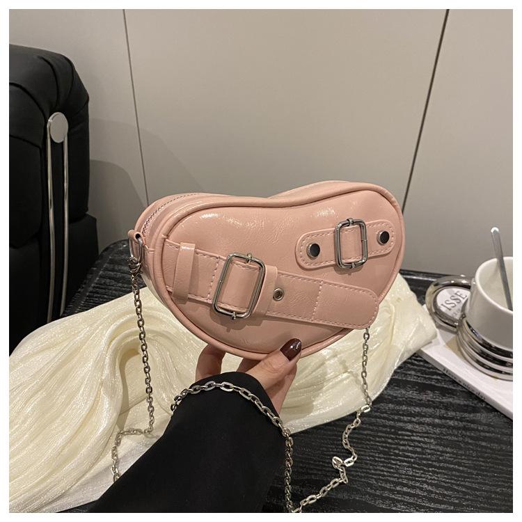 

Popular simple messenger shell bag women s 2025 spring new trendy Korean version punk sweet cool love locomotive shoulder bag розовый
