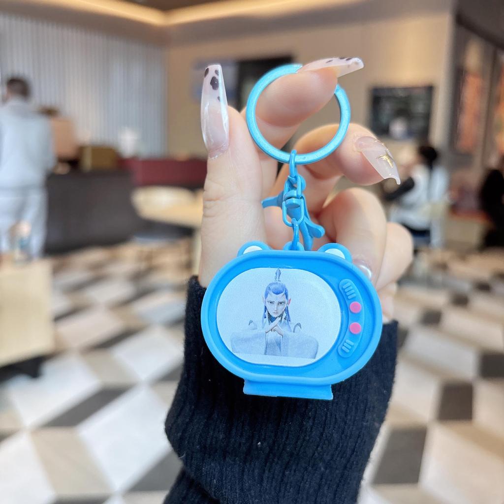 Nezha Luminous TV Keychain with Light - Student Backpack Pendant Ornament.
