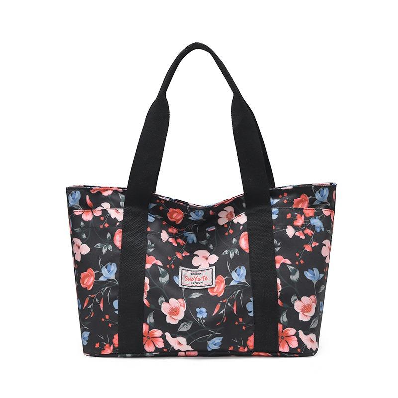 

New large-capacity tote bag women s hand-held canvas bag to work commuter women s bag mother bag printed shoulder bag