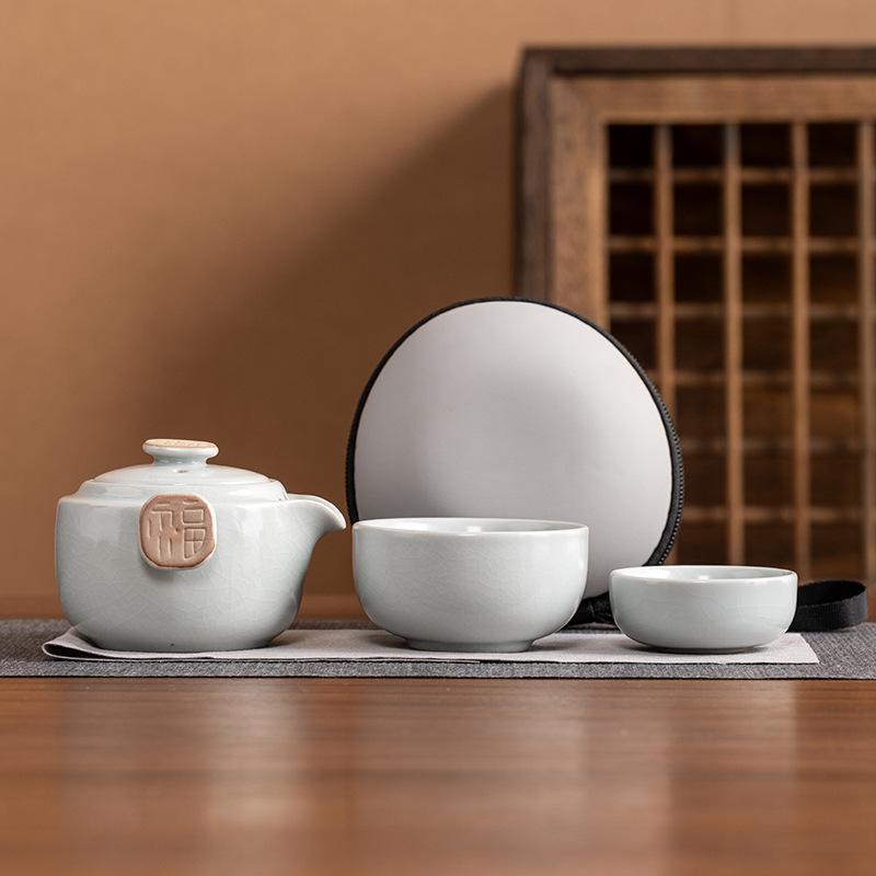 Ru kiln travel tea set, high-end one pot and two cups, open film can be raised, light luxury business holiday commemorative gifts