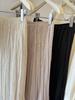 French High-End Black Satin Pleated Mermaid Skirt for Women - Spring New Arrival, Slimming A-line Design
