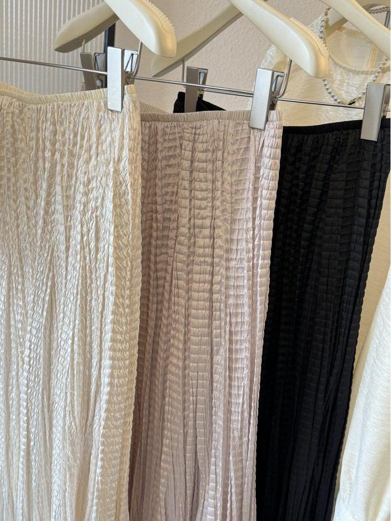 French High-End Black Satin Pleated Mermaid Skirt for Women - Spring New Arrival, Slimming A-line Design