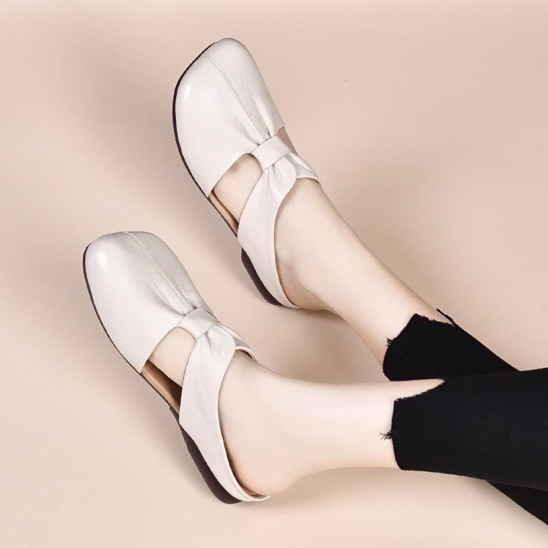 Spring and summer new retro low-heeled soft leather soft surface soft bottom square head hollow cool slippers