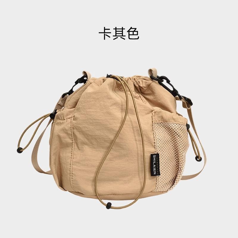

Повседневная мини женская нишевая легкая сумка Новая сумка для мобильного телефона Универсальная сумка-ведро с завязками Женская сумка через плечо No specification хаки