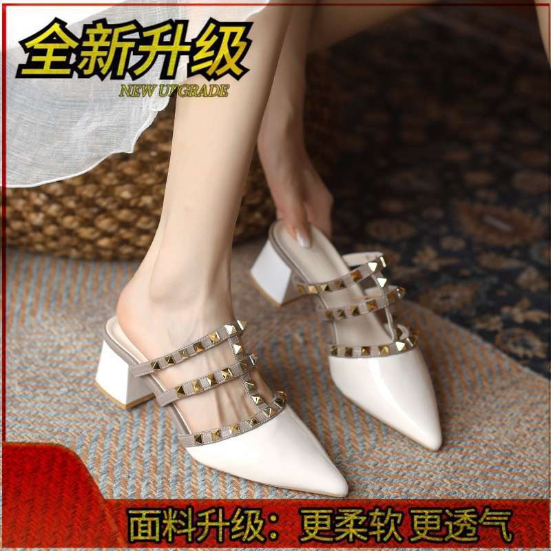 

Summer 2025 new medium heel rivet cool slippers women s wear lazy thick heel pointed head patent leather bag head half drag 40