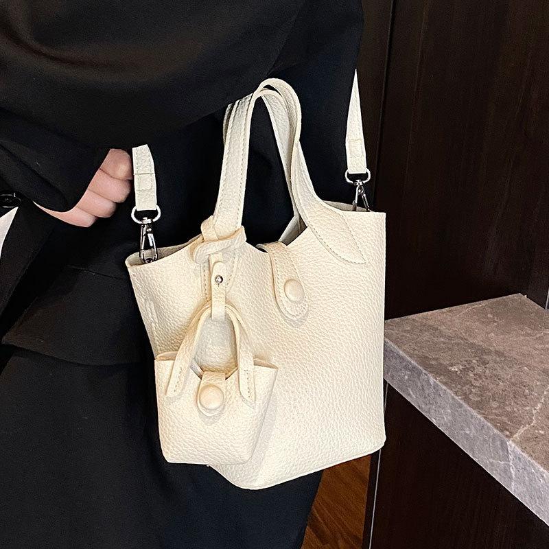 Korean hot-selling simple and high-end lychee pattern portable vegetable basket bag niche design fashionable and versatile messenger women's bag