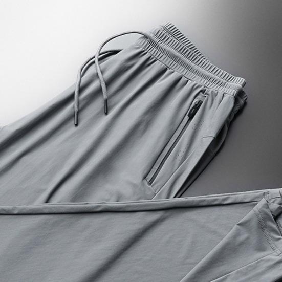 שיקי Loose ספיגת זיעה ספורטיבית דקה רשת קיץ מכנסי טרנינג גברים מכנסי בגד