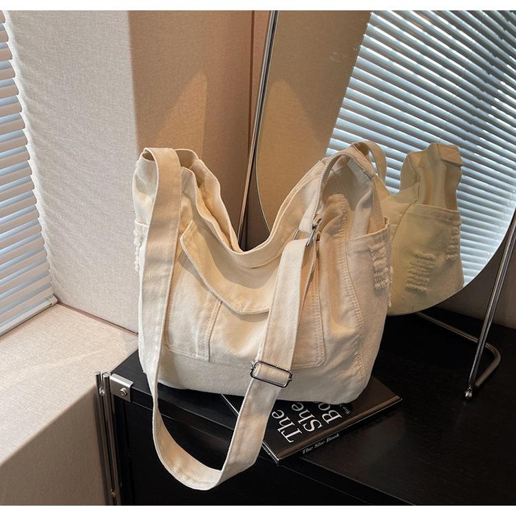 Canvas bag women's large-capacity new summer casual high-end niche lazy wind messenger bag