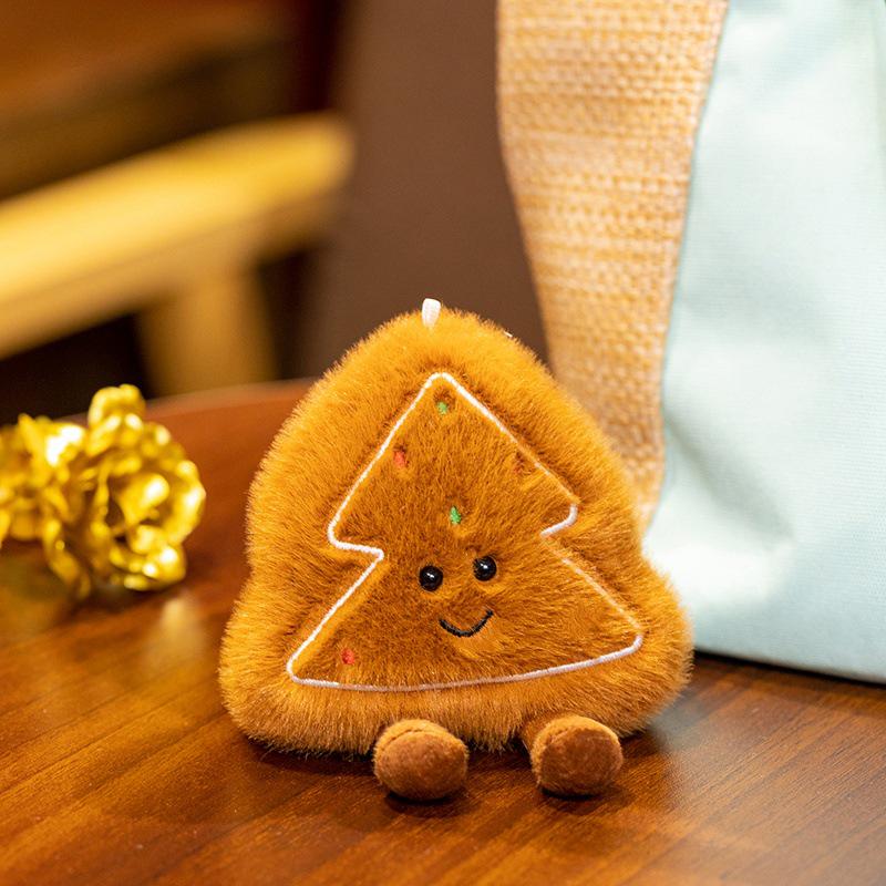 Christmas Holiday Decoration: Tree Plush, Apple Peace Wreath, and Gingerbread Man Throw Pillow.