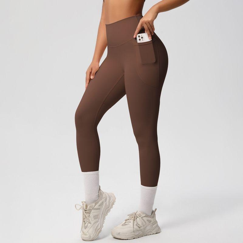 Fashion Nude Feel Beauty Back Cross Bubble Wrap Sports Bra High Waist Hip Lift Pocket Sports Yoga Pants Fitness Suit Women