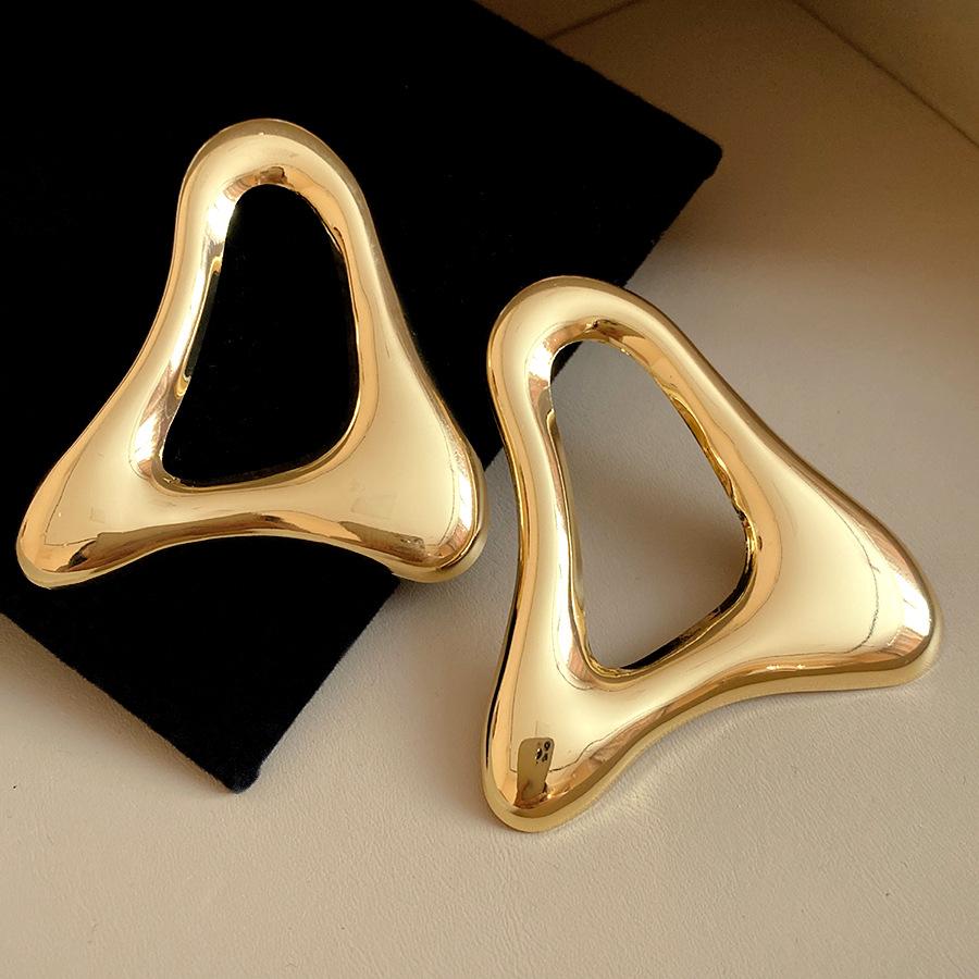 

European and American silver needle smooth hollow triangular stud earrings retro simple temperament earrings light luxury high-end earrings