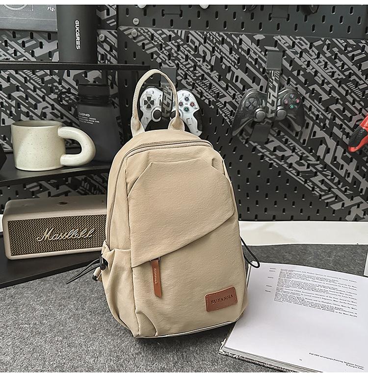 

Spring and summer new student large-capacity waterproof nylon fabric backpack contrasting color couple breast bag backpack хаки
