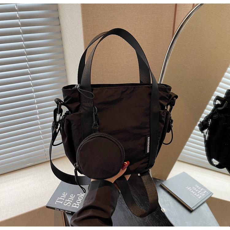 

Canvas bag women s summer new fashion versatile niche messenger bag portable bucket bag чорний