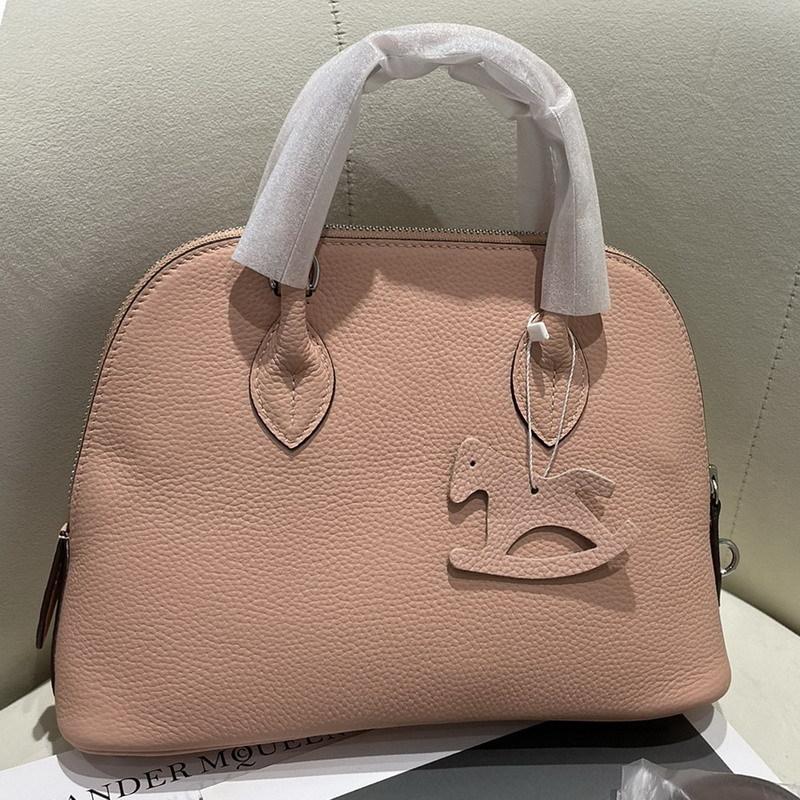 

New first-layer cowhide shell bag, portable oblique span bowling bag, fashionable leather women s bag 19cm*13cm*8cm