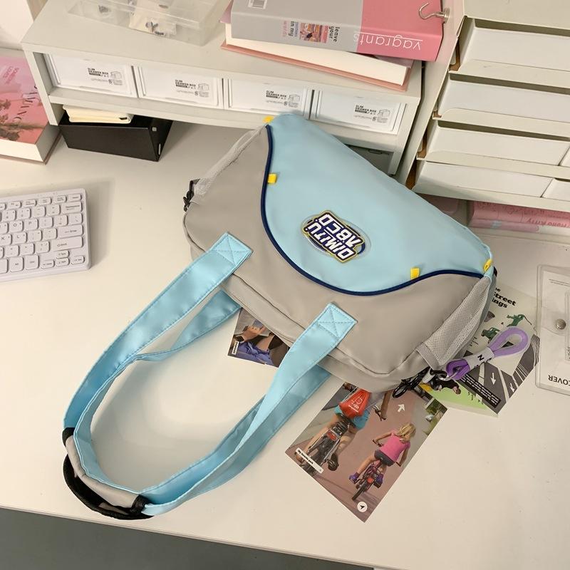 

Школьный рюкзак лето новый школьный рюкзак нейлон популярные контрастные цвета старшеклассники студенты колледжа женская мода портативная сумка через плечо светло-синий