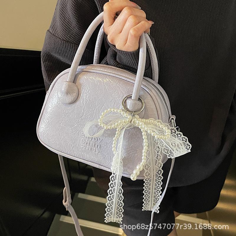 Korean Version of Ins Fashion Hand-held Bowling Bag Women's 2025 Simple and Versatile Shoulder Bag High-end Casual Crossbody Bag