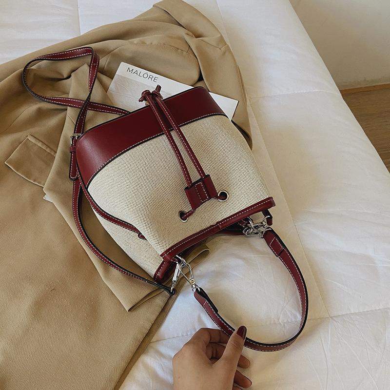 Dámské tašky Evropské a americké tašky Diagonální tašky Šňůrka Splicing Plátno Přenosné kbelíkové tašky