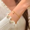 Gold Double-Layer Star Pendant Bracelet for Women - Small Wrist Design, Unique & Elegant.