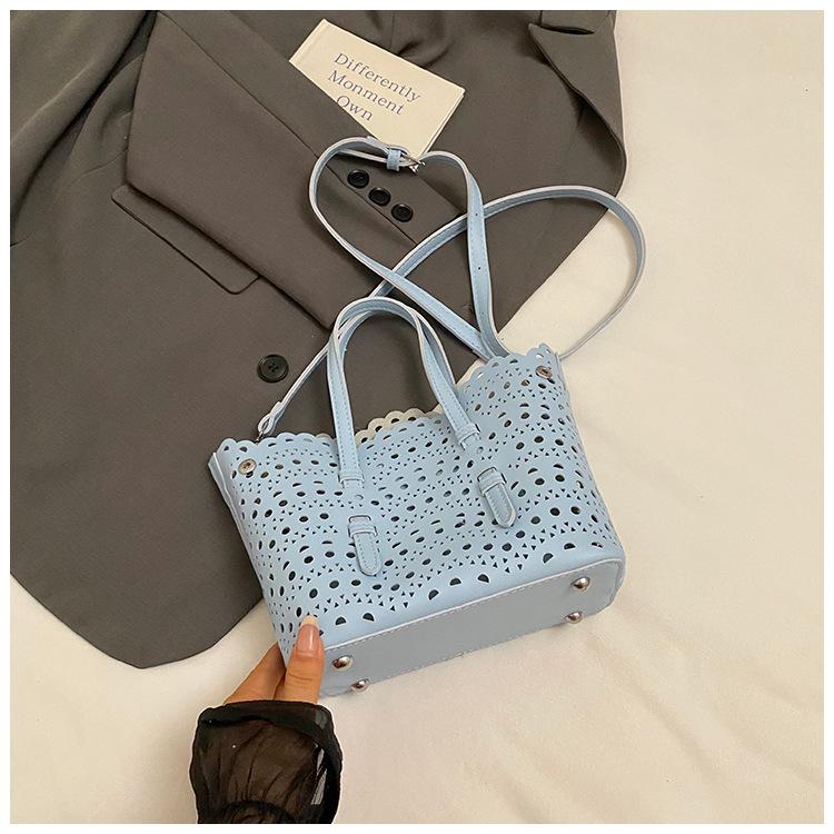 

2025 новая сумка-тоут французский нишевый дизайн модная универсальная ажурная сумка-корзина для овощей повседневная сумка-мессенджер для поездок на работу синий